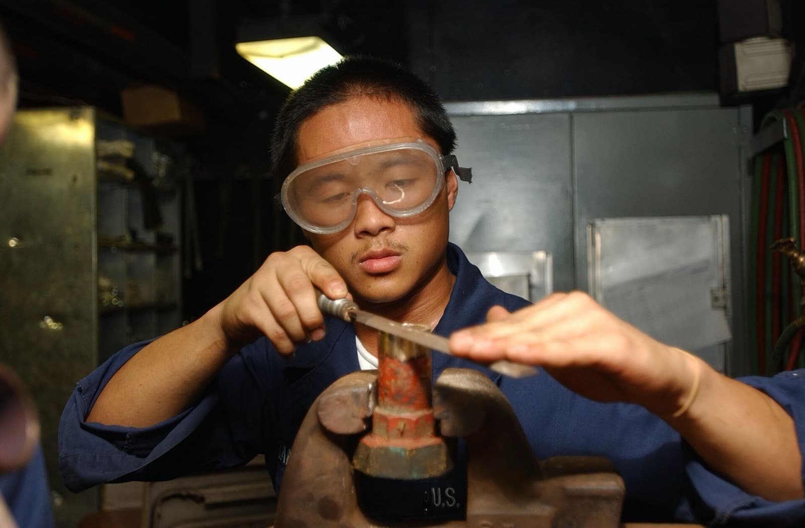 Repairing a pipe fitting at the bench